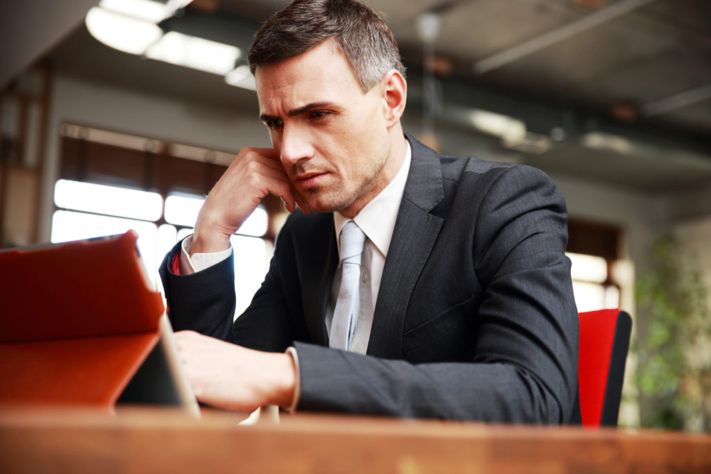 Business man debating whether he should go with 3rd party AV company or the in-house AV company for his event.